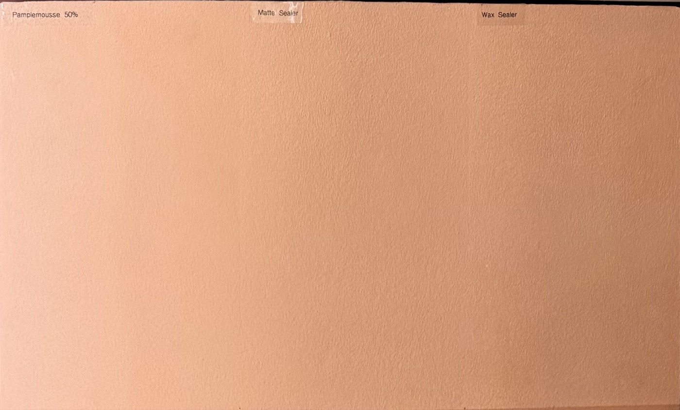 One limewash color on a sample board — bare, with matte sealer, and with wax sealer